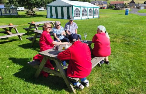 Photo of the group enjoying drinks at Elsdon